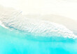 Aerial top view of the beach wave on tropical sea in summer background