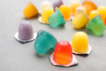 Wall Mural - Tasty bright jelly cups on light table