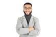 Young handsome Asian man with beard wearing jacket and glasses on white background happy face smiling with crossed arms looking at camera. Positive person.