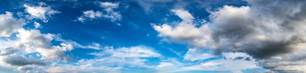 Wall Mural - panorama blue sky and dark clouds.fluffy cloud in the blue sky background.vivid sky on dark cloud be