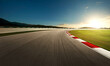 © Image Craft - Motion blur race track during sunset.
