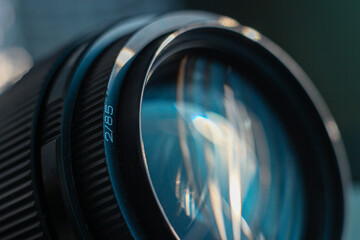 Sticker - Closeup shot of a camera lens with light reflections