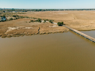 Wall Mural - Aerial view of a bridge over a flowing river in Georgetown, SC, United States