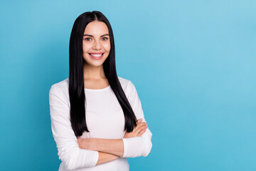 Wall Mural - Photo of hr millennial brunette lady crossed palms wear white shirt isolated on blue color background