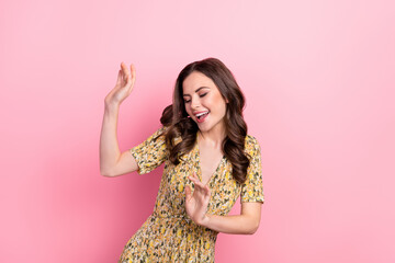 Canvas Print - Photo of impressed young brunette lady dance wear yellow dress isolated on pink color background