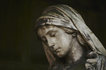 Poster - Closeup shot of an old rusty statue in a church