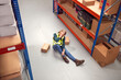 © Monkey Business - Female Worker With Injured Leg On Floor After Workplace Accident In Warehouse