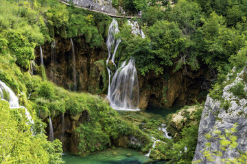 Sticker - Beautiful shot of waterfall with moss and plants in Plitvice Lakes National Park, Croatia