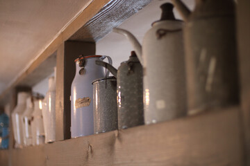 Sticker - Close-up of a several vintage teapots