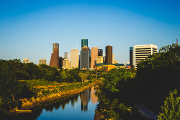 Sticker - Mesmerizing view of modern buildings against a blue sky on a sunny day in Houston, Texas