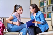Woman School Psychologist Teacher Talking And Helping Student, Girl Teenager