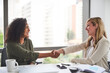 © Camerene Pendl/peopleimages.com - She worked hard for this opportunity. Cropped shot of businesswomen shaking hands in the office.