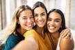 © Xavier Lorenzo - Three multi ethnic young female friends laughing together taking selfie outdoors - Multiracial women having fun on summer vacation in Italy - Unity happy people and friendship concept