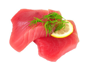 Wall Mural - Two fresh raw yellow fin tuna fish meat steaks with lemon and dill herb garnish