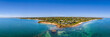 Aerial shot of Daveys Bay Pelican Point, Mount Eliza coastal seascape with turquoise sea and clear blue sky aerial panoramic