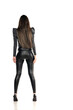 © vladimirfloyd - Back view of an attractive young woman posing in gray blouse and latex trousers. Fashion look on a white