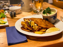 Frankfurter Schnitzel, Pork Schnitzel With Fried Potatoes And Green Sauce. Dreieich, Hesse, Germany
