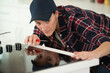© auremar - woman fitting new electrical hob