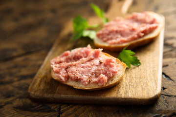 Sticker - Traditional pork pate or sausage on a white bread