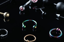 Stylish Jewelry For Piercing On Black Background