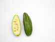 whole and slice pointed gourd potol on white background