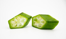 Two Pieces Of Okra Isolated On The White Background,