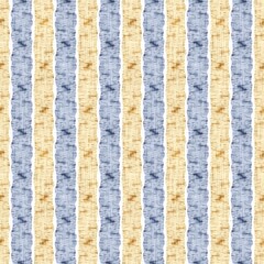 Seamless French country kitchen stripe fabric pattern print. Blue yellow white vertical striped background. Batik dye provence style rustic woven cottagecore textile. 