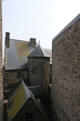 Rocket island, famous sanctuary abbey Monastery fortress Mont Saint Michel in Normandy, France. Tourist sight attraction with breathtaking nature landscape coast and historic medieval old town house