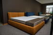 Exhibition of comfortable stylish beds with orthopedic mattresses in the furniture store showroom