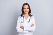 © deagreez - Photo of qualified lady paramedic cross arms ready stop cov pandemic isolated over grey color background