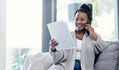Aufkleber - Great financial advice is just a call away. Shot of a young woman going over paperwork and using a smartphone on the sofa at home.