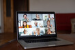 © Angelov - Virtual meeting online. Video conference by laptop. Online business meeting. On the laptop screen, people who gathered in a video conference to work on-line