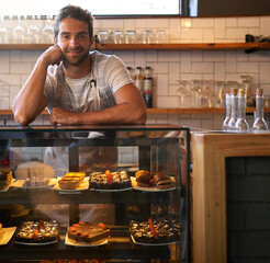 Poster - Providing service with a smile. Portrait of a young business owner standing in a cafe.