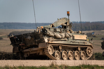 Army armoured personnel carrier on a military exercise