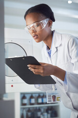 Poster - Drawing conclusions from her observations. Shot of a young scientist working in a lab.
