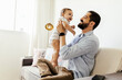 © kleberpicui - Father and his baby son playing at home