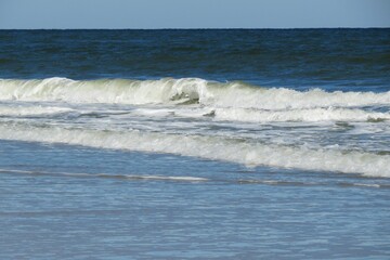 Wall Mural - Waves on ocean background in Atlantic coast of North Florida 