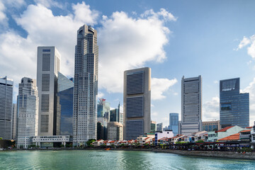 Wall Mural - Skyscrapers at downtown and azure water in Boat Quay, Singapore