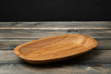 Wooden board for food on wooden background