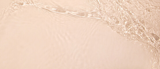 abstract summer banner background transparent beige clear water surface texture with ripples and spl