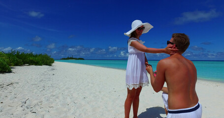 Wall Mural - Romantic marriage proposal on the beach, Rasdhoo Island, The Maldives