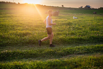 Wall Mural - man running  at sunset healthy active lifestyle