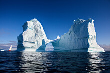 Beautiful Landscape With Large Icebergs In The Middle Of The Sea In Greenland