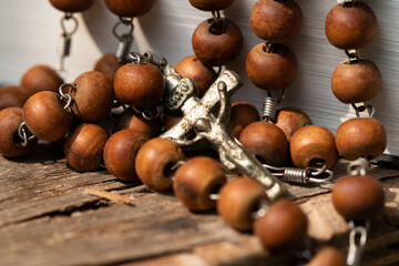 Rosary with a cross made of wooden beads.