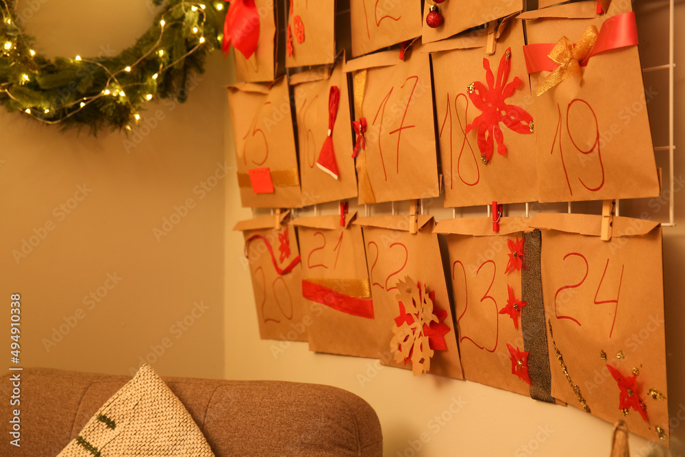 Advent calendar on wall in room, closeup