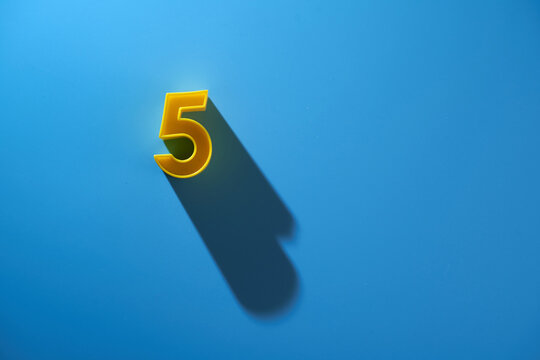 number 5 on blue background