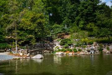 Wall Mural - Wooden bridge and lake at Anderson Japanese Gardens, Rockford, Illinois, United States