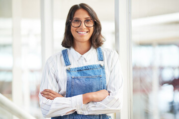 Sticker - Its the coolest company to work for. Portrait of a confident young businesswoman working in a modern office.