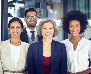 Aufkleber - Dedication is what makes a team work. Portrait of a team of corporates standing together in an office.