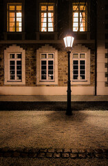 Wall Mural - Vertical shot of the side wing of the Grandhotel Schloss Bensberg, Germany at night